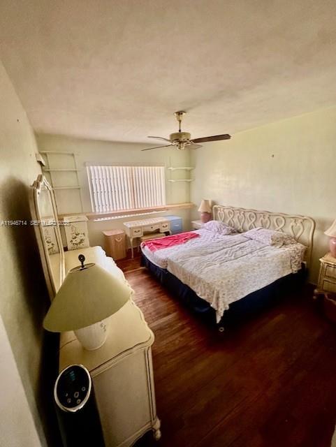 7215 Southwest 23rd Street Miami, FL 33155 - Photo 6 of 10 a bedroom with a bed and cabinets