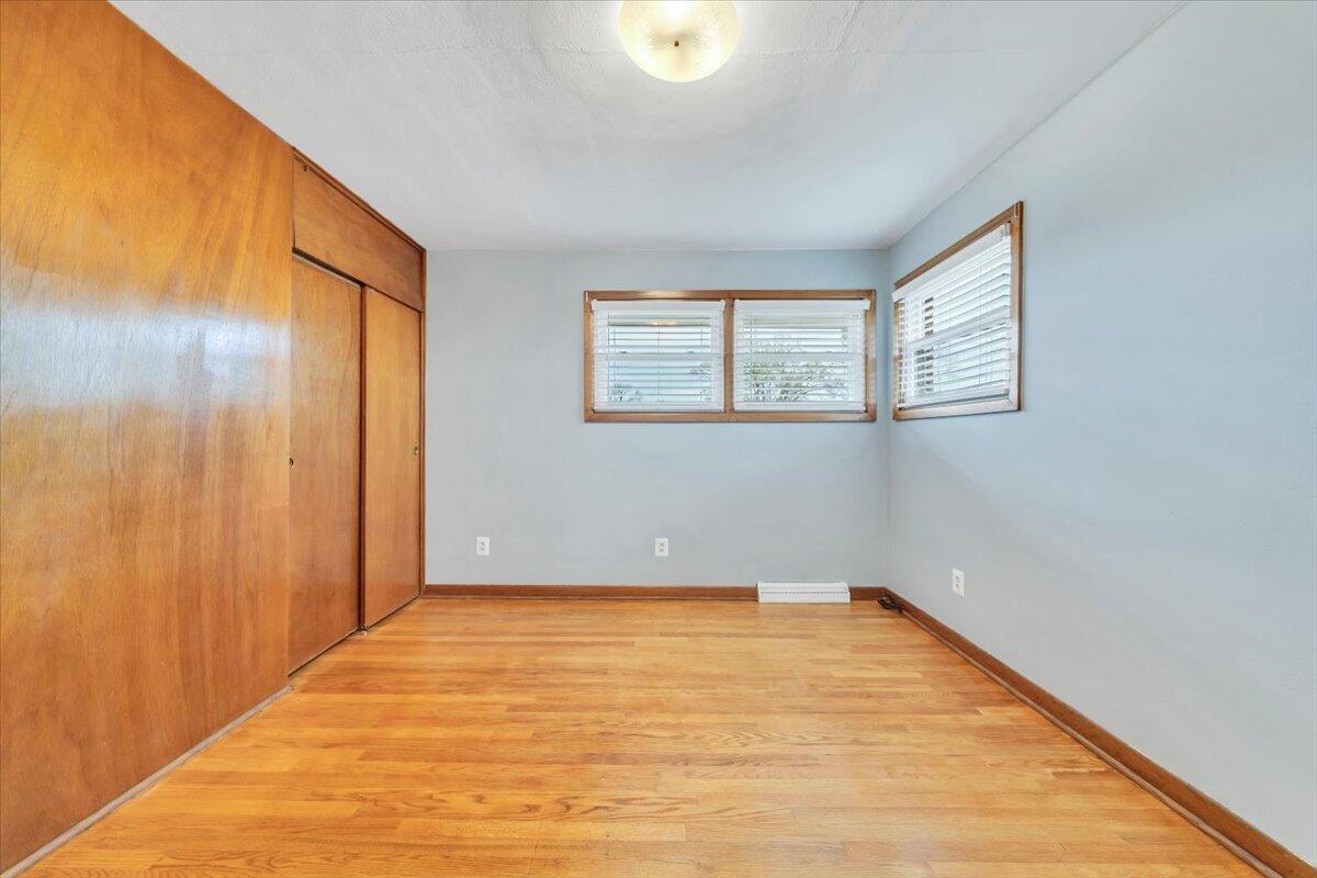 5156 Hazelridge Road Northwest Roanoke, VA 24012 - Photo 14 of 30 a view of empty room with wooden floor and fan