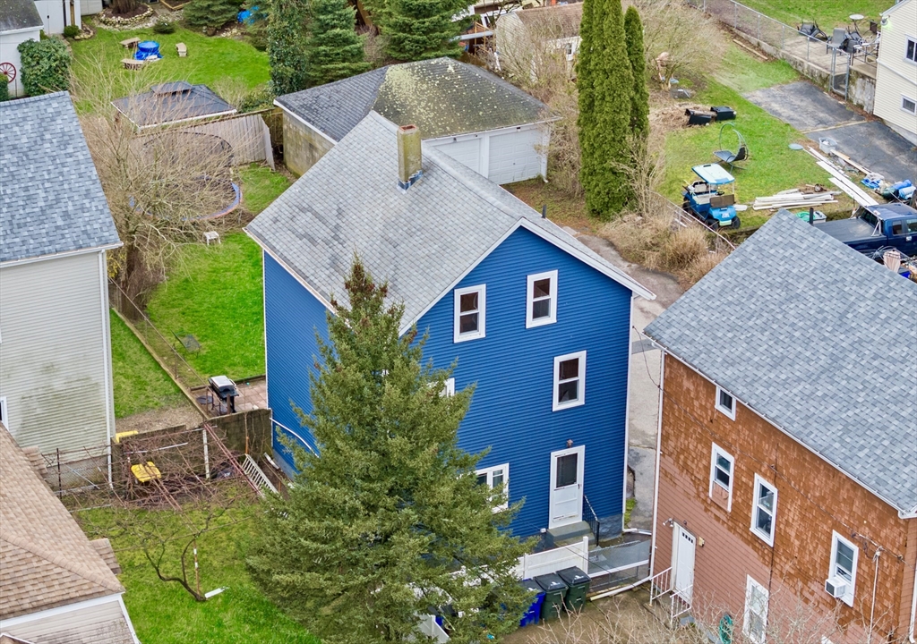 461 Snell Street Fall River, MA 02721 - Photo 1 of 25 an aerial view of a house with a yard