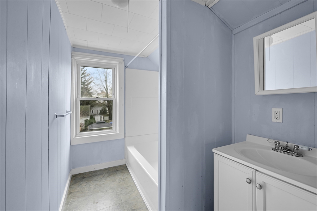 461 Snell Street Fall River, MA 02721 - Photo 23 of 25 a view of a room that has a window in it