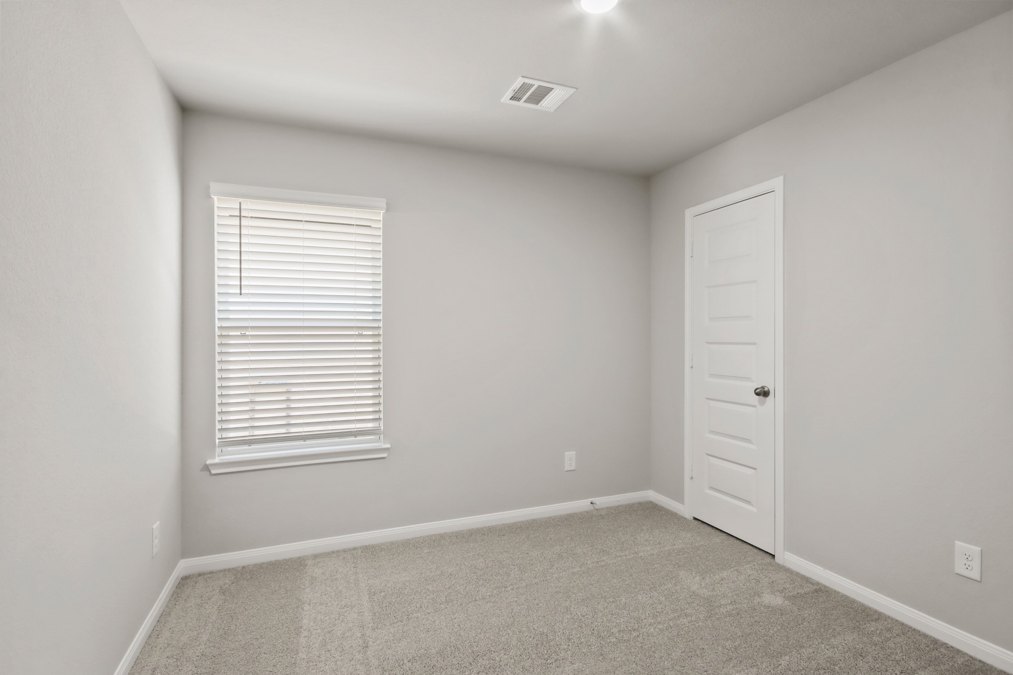9227 Grace Rdg Drive Willis, TX 77318 - Photo 12 of 23 an empty room with a window