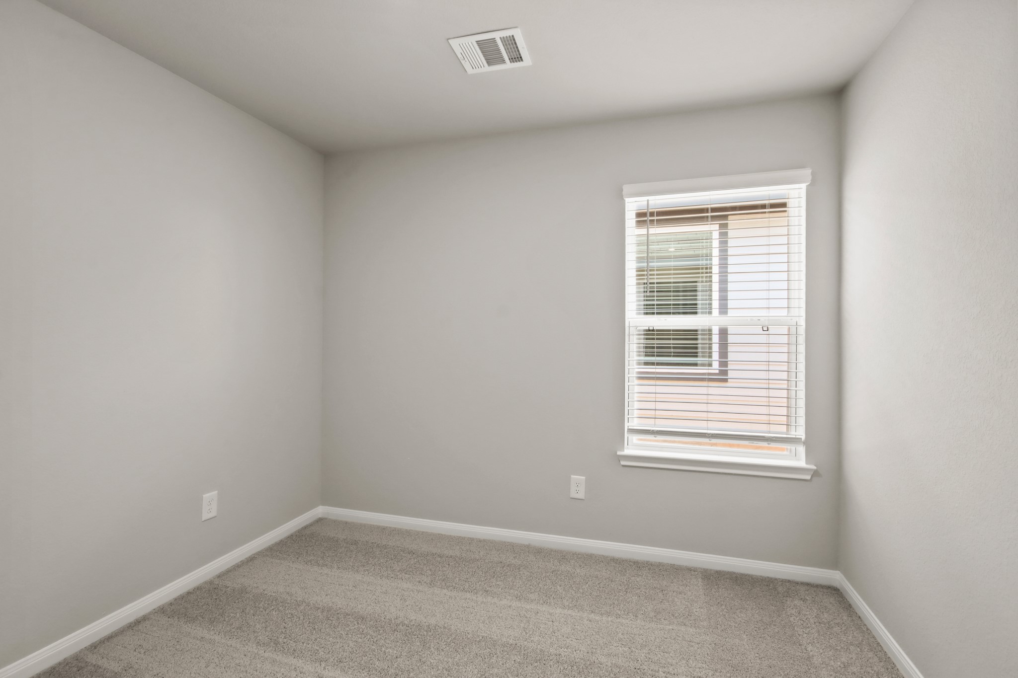 9227 Grace Rdg Drive Willis, TX 77318 - Photo 15 of 23 an empty room with a window