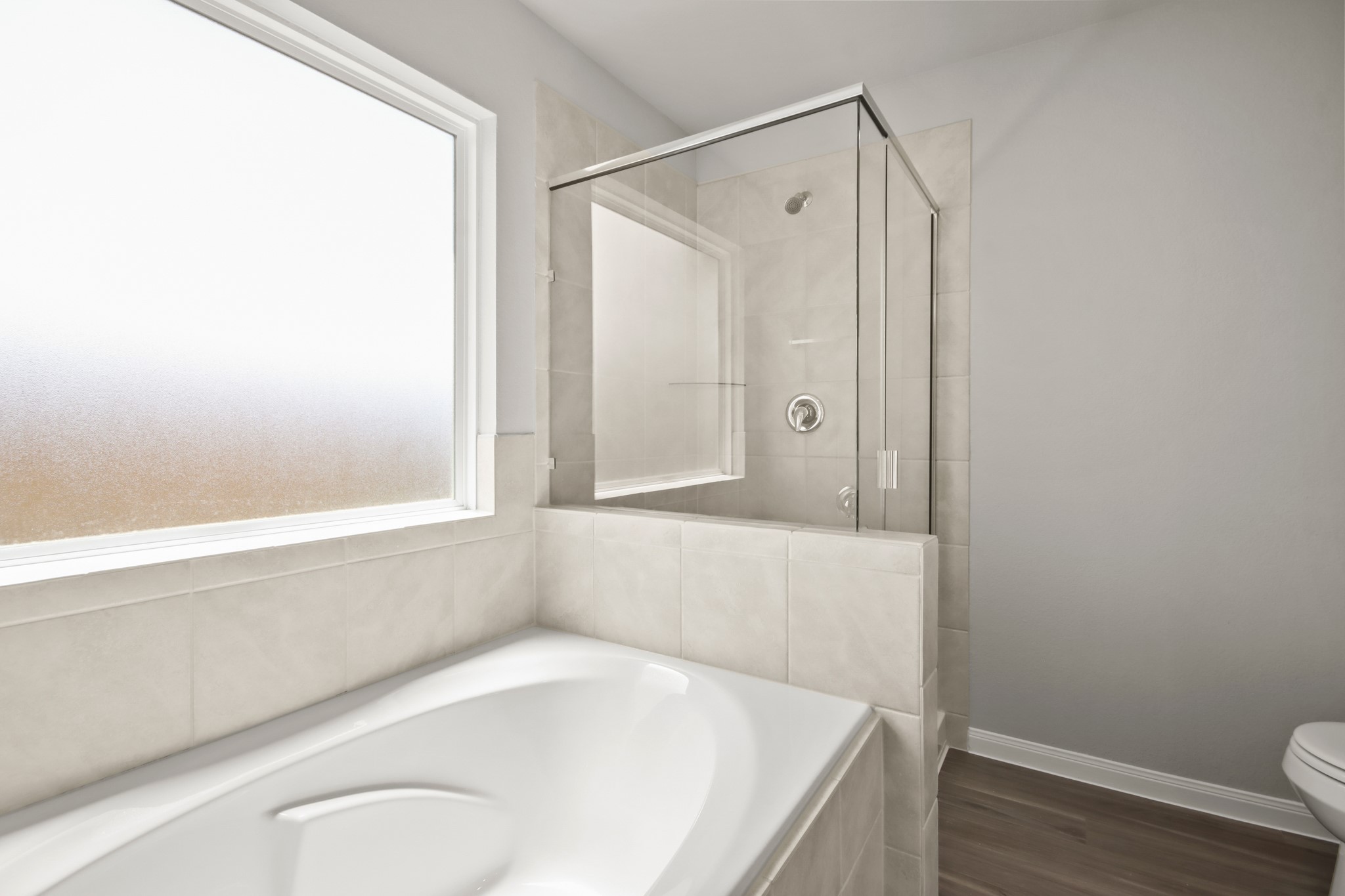 9227 Grace Rdg Drive Willis, TX 77318 - Photo 10 of 23 a bathroom with a tub and shower