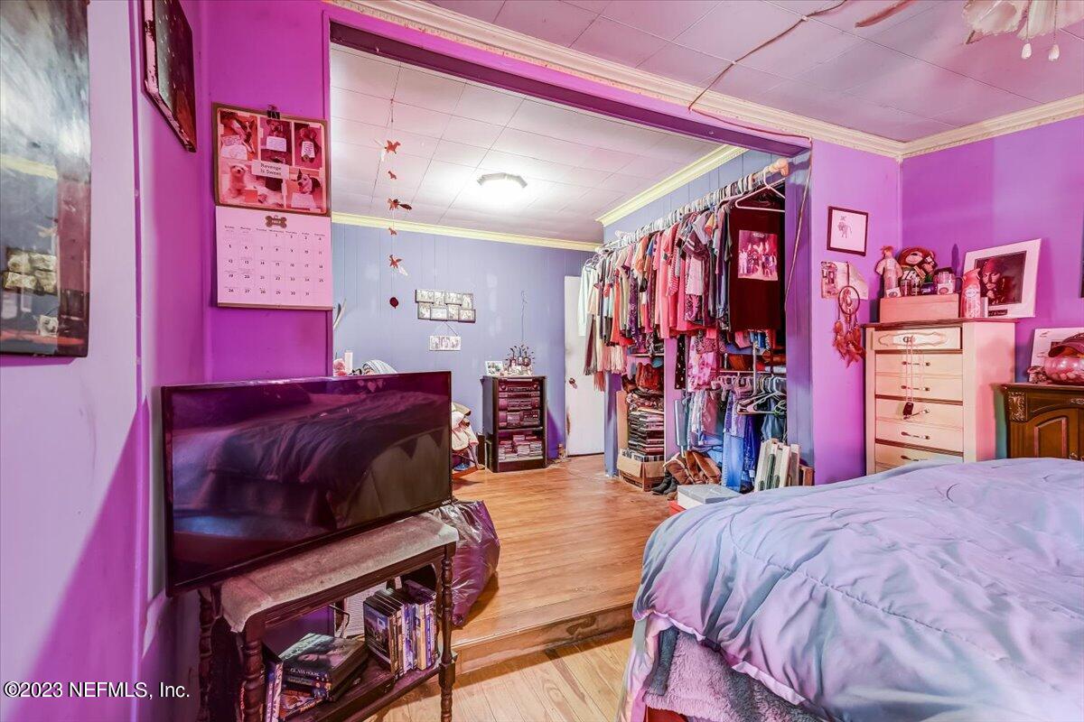 86290 Weldon Road Yulee, FL 32097 - Photo 19 of 46 a bed room with a bed and closet