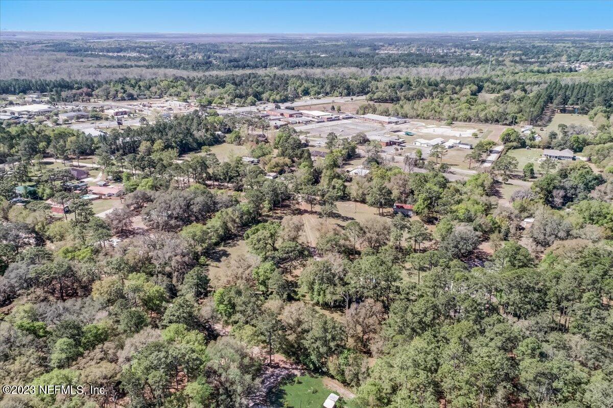 86290 Weldon Road Yulee, FL 32097 - Photo 27 of 46 an aerial view of a town with trees