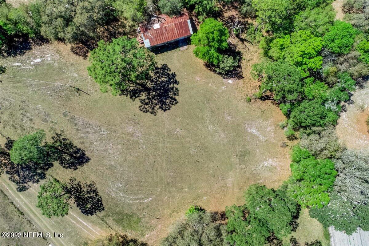 86290 Weldon Road Yulee, FL 32097 - Photo 45 of 46 an aerial view of a house with a yard