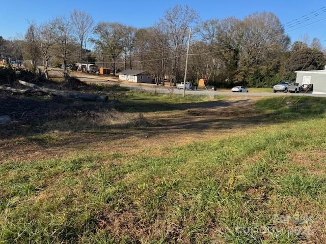 409 North Post Road Shelby, NC 28150 - Photo 2 of 4 a backyard of a house with lots of green space