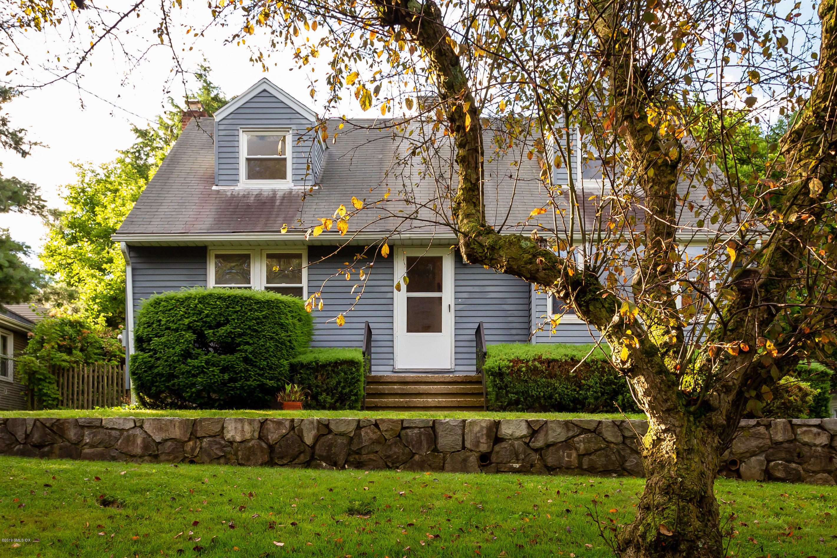 20 Silver Beech Road Riverside, CT 06878 - Photo 1 of 33 a front view of a house with a yard