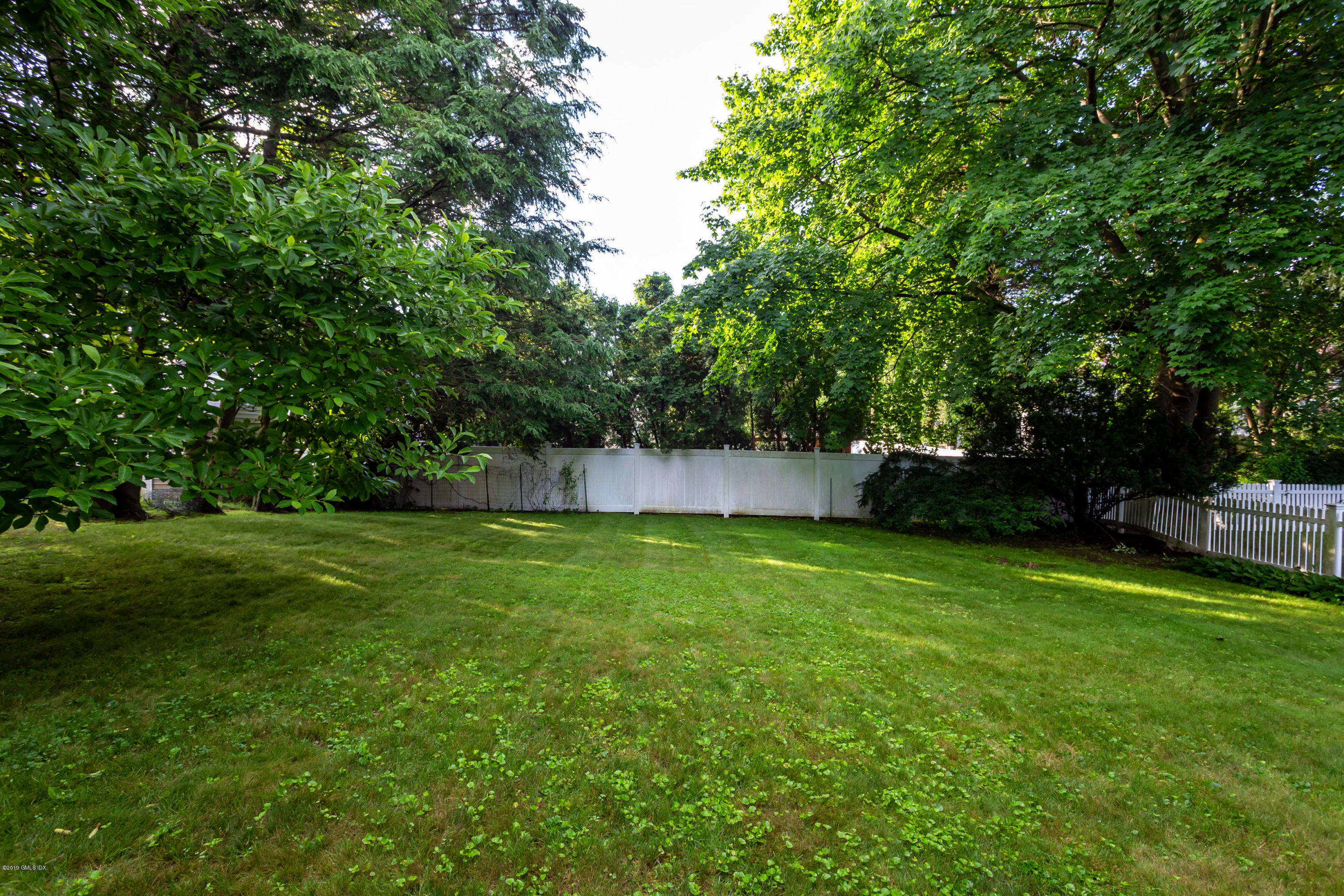 20 Silver Beech Road Riverside, CT 06878 - Photo 22 of 33 a view of a backyard with a garden