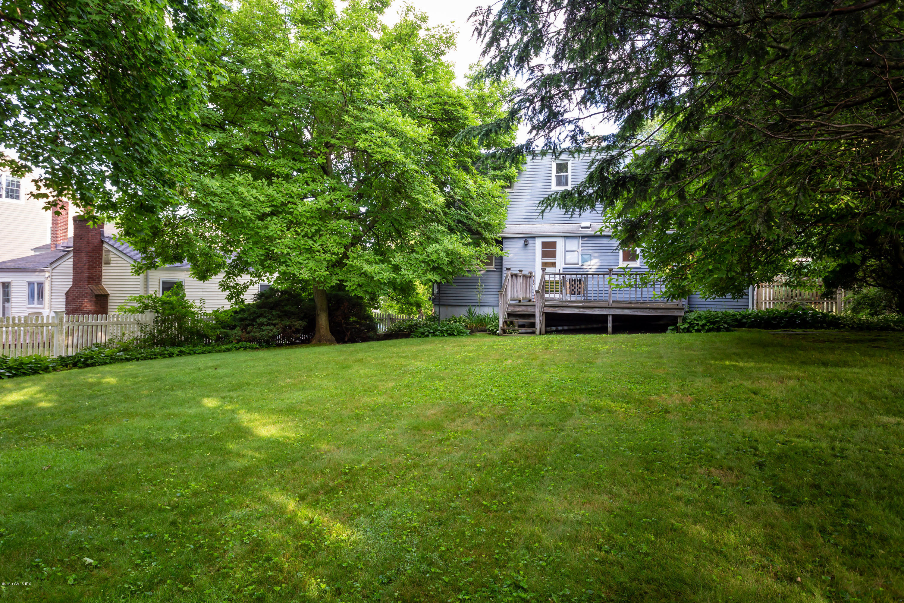 20 Silver Beech Road Riverside, CT 06878 - Photo 27 of 33 a house view with a garden space