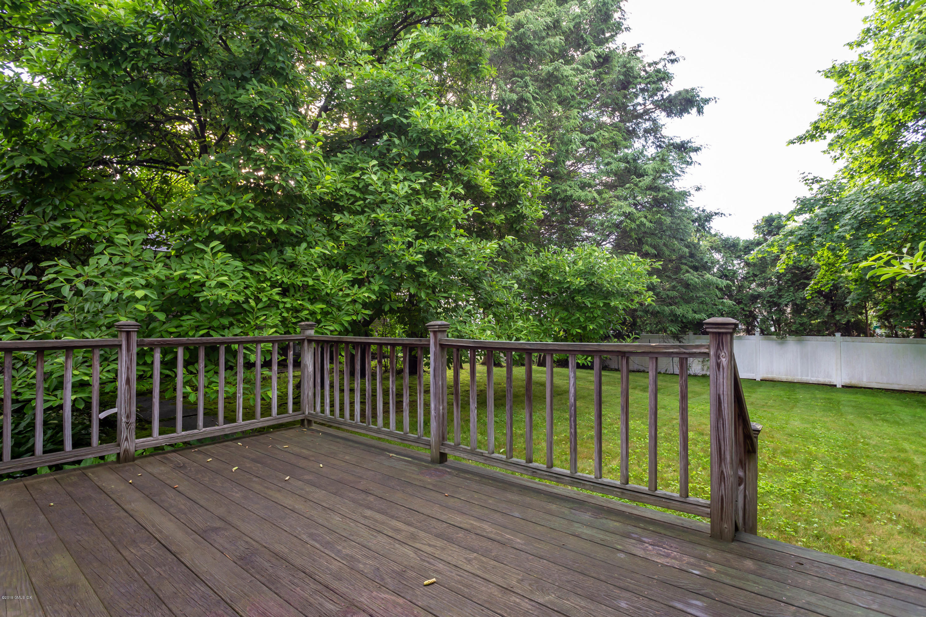 20 Silver Beech Road Riverside, CT 06878 - Photo 28 of 33 a view of balcony with wooden floor and fence