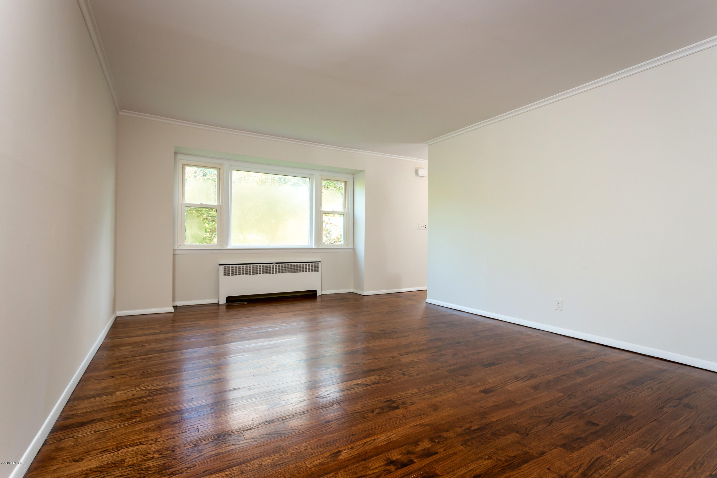 20 Silver Beech Road Riverside, CT 06878 - Photo 8 of 33 a view of room with window and wooden floor