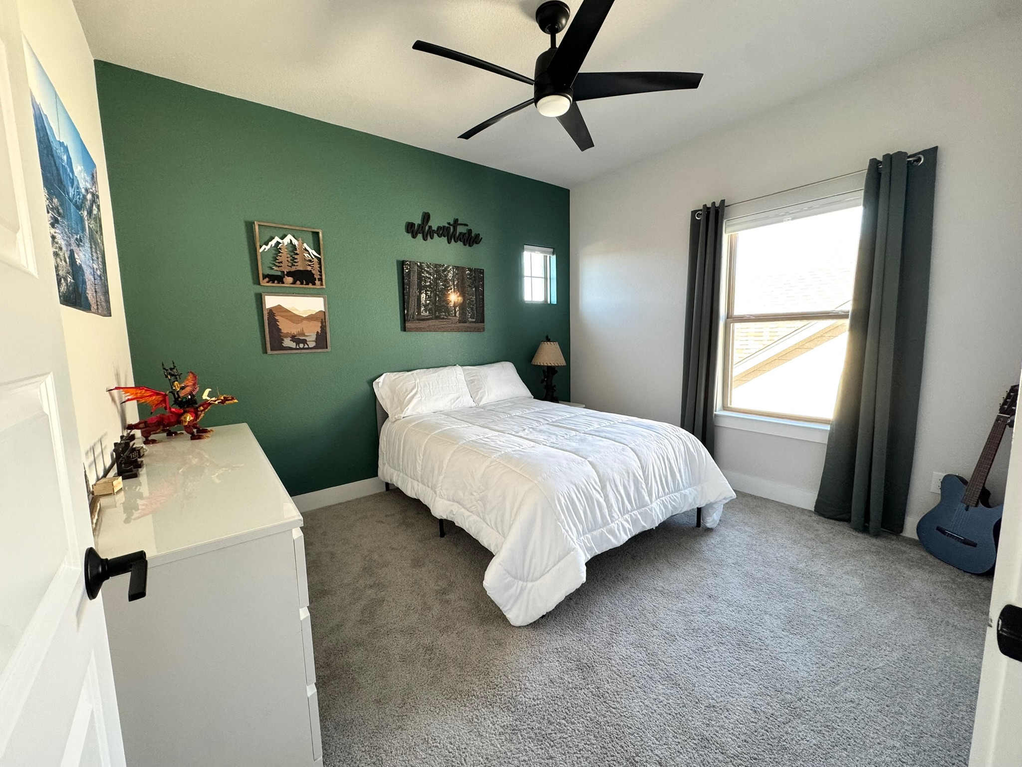 561 Cold Riv Run Kyle, TX 78640 - Photo 15 of 33 a bedroom with a bed and a dresser