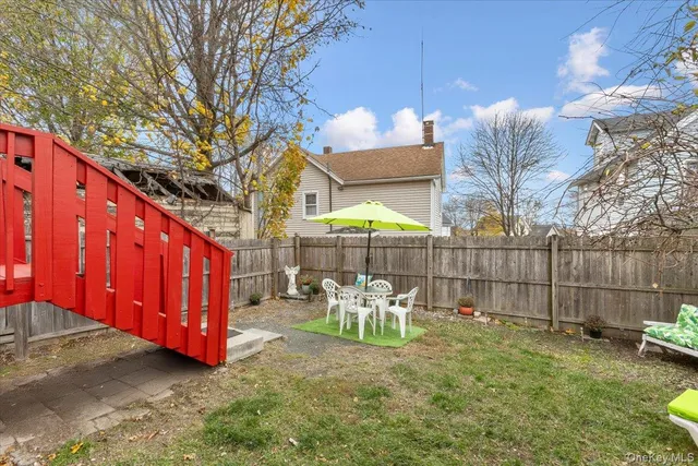 a view of a street with a building in the background