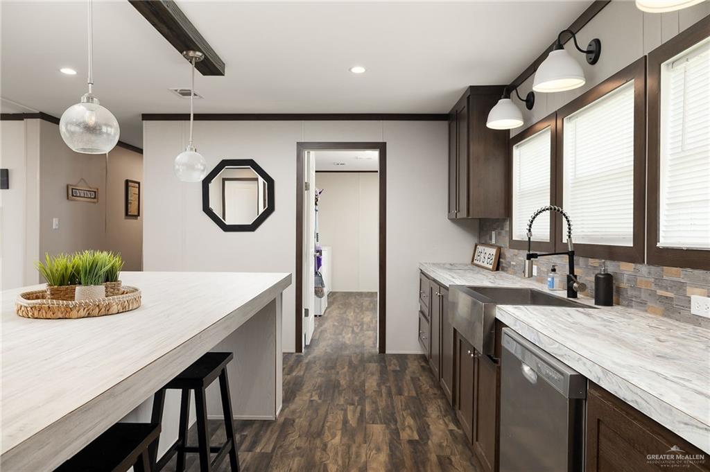 35237 General Brant Road Rio Hondo, TX 78583 - Photo 8 of 27 a kitchen with a table chairs sink and stove