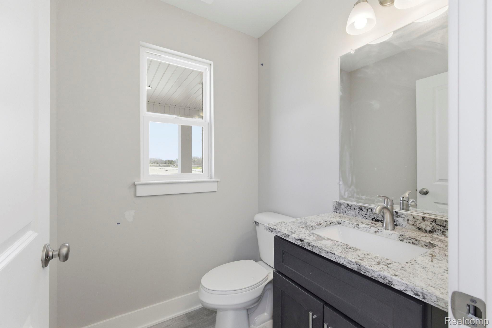 2361 Baltimore Davison, MI 48423 - Photo 5 of 31 Bathroom featuring vanity and baseboards