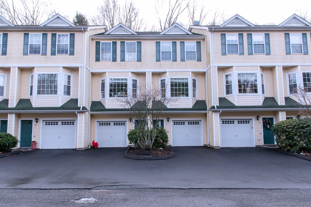 21 Great Oak Ridge Way, Unit 21 Seymour, CT 06483 - Photo 1 of 1 a front view of a building with a street