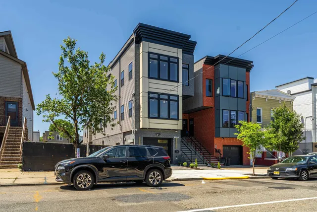 a car parked in front of a house