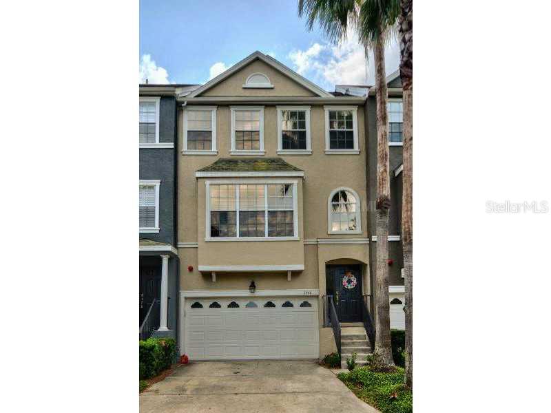 1446 Harbour Walk Road Tampa, FL 33602 - Photo 1 of 1 a front view of a house with a garden