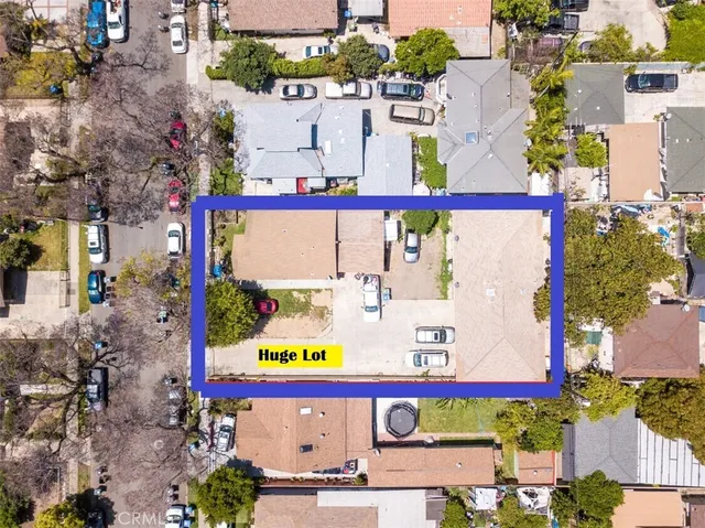 an aerial view of a red and sign board