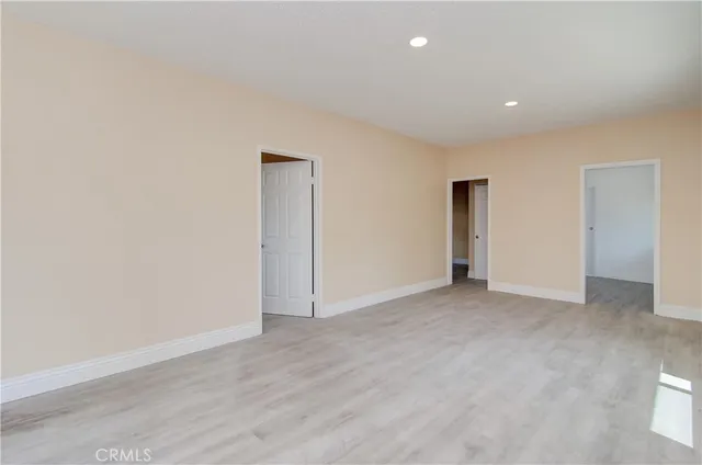 a view of storage and utility room with washer and dryer