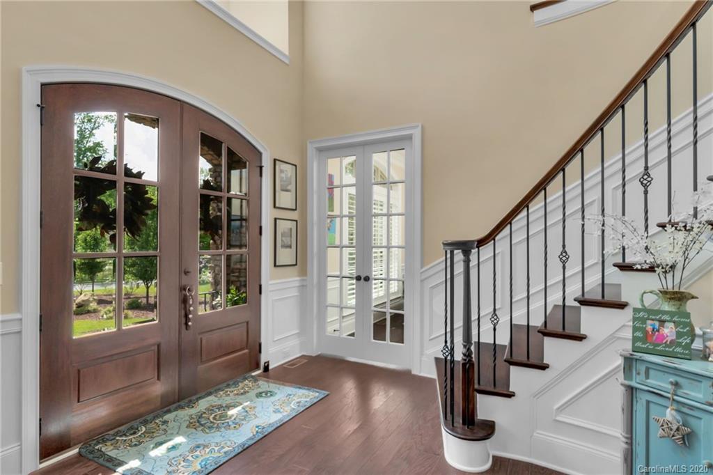 1401 Delaney Drive Weddington, NC 28104 - Photo 13 of 48 a view of an entryway with wooden floor and door