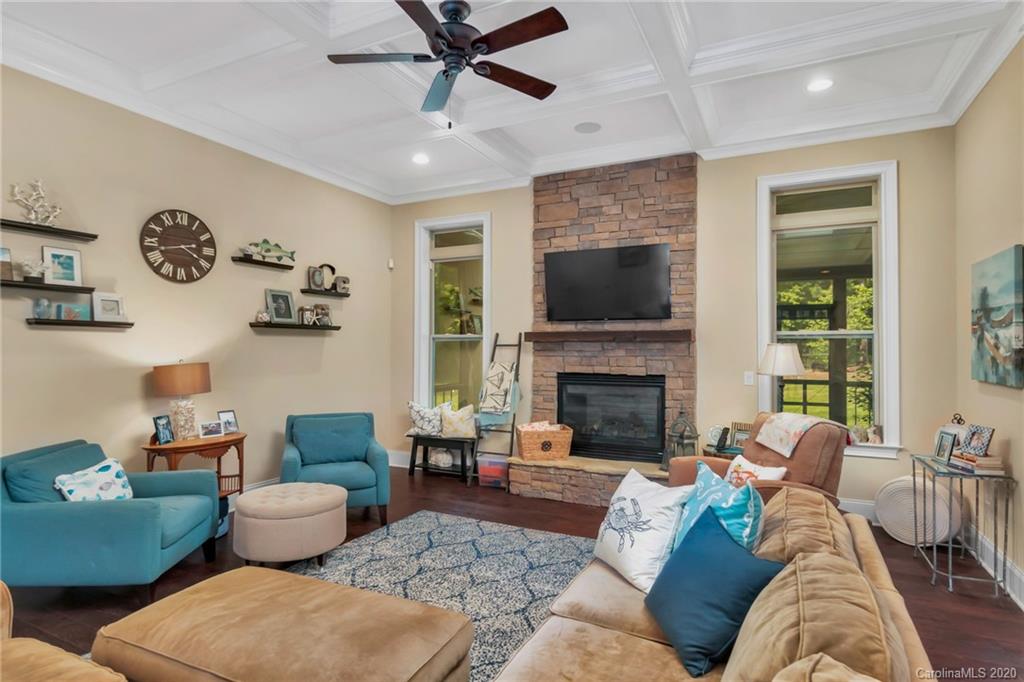 1401 Delaney Drive Weddington, NC 28104 - Photo 14 of 48 a living room with furniture and a fireplace