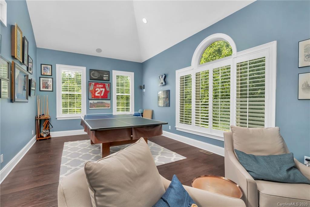 1401 Delaney Drive Weddington, NC 28104 - Photo 26 of 48 a living room with furniture and a table