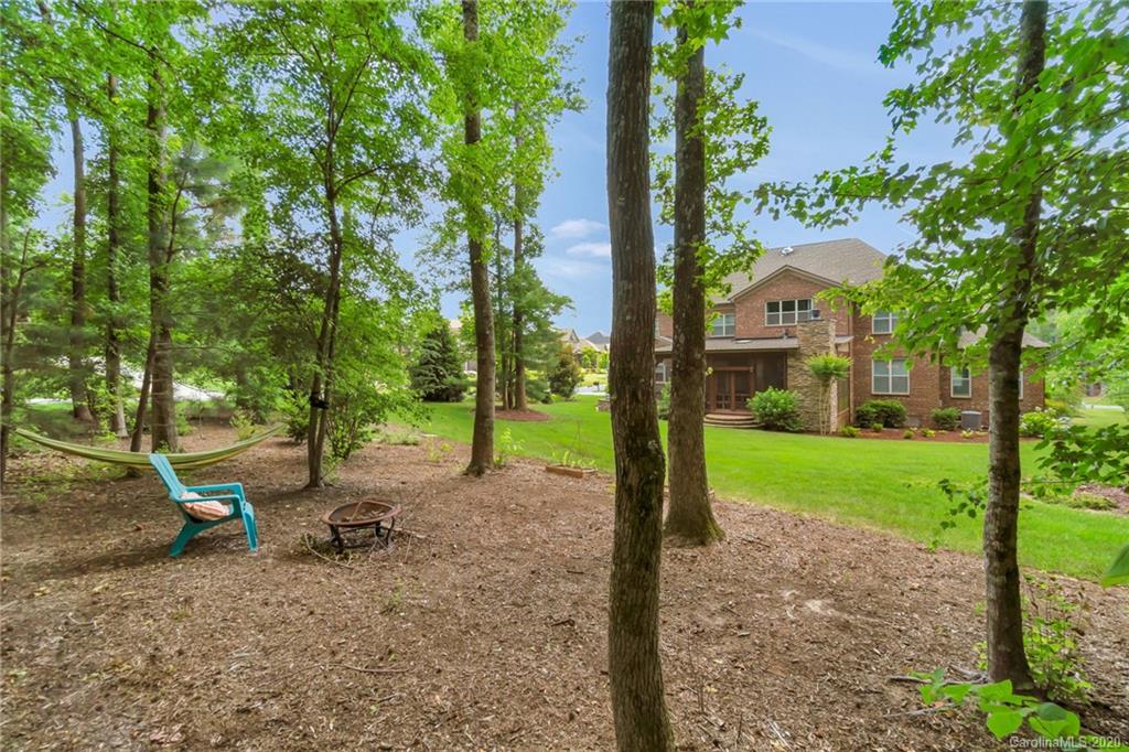 1401 Delaney Drive Weddington, NC 28104 - Photo 42 of 48 a view of a park with large trees