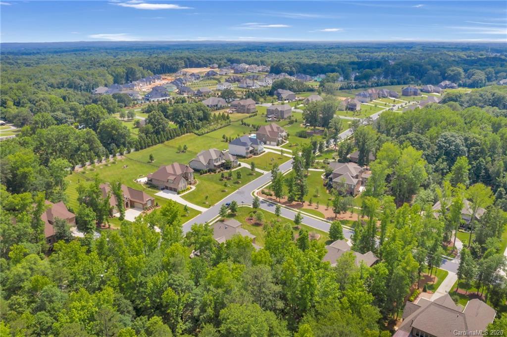 1401 Delaney Drive Weddington, NC 28104 - Photo 45 of 48 an aerial view of residential houses with outdoor space and trees