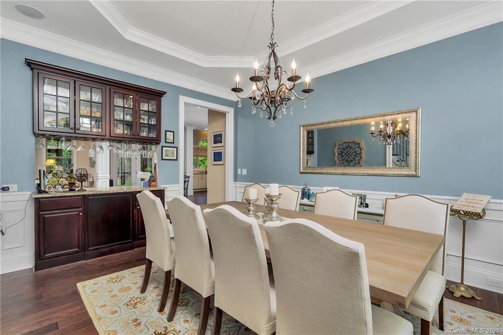 1401 Delaney Drive Weddington, NC 28104 - Photo 9 of 48 a view of a dining room with furniture window and wooden floor