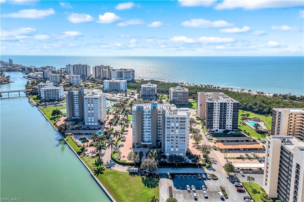 21 Bluebill Avenue, Unit B503 Naples, FL 34108 - Photo 2 of 40 a view of a city with tall buildings