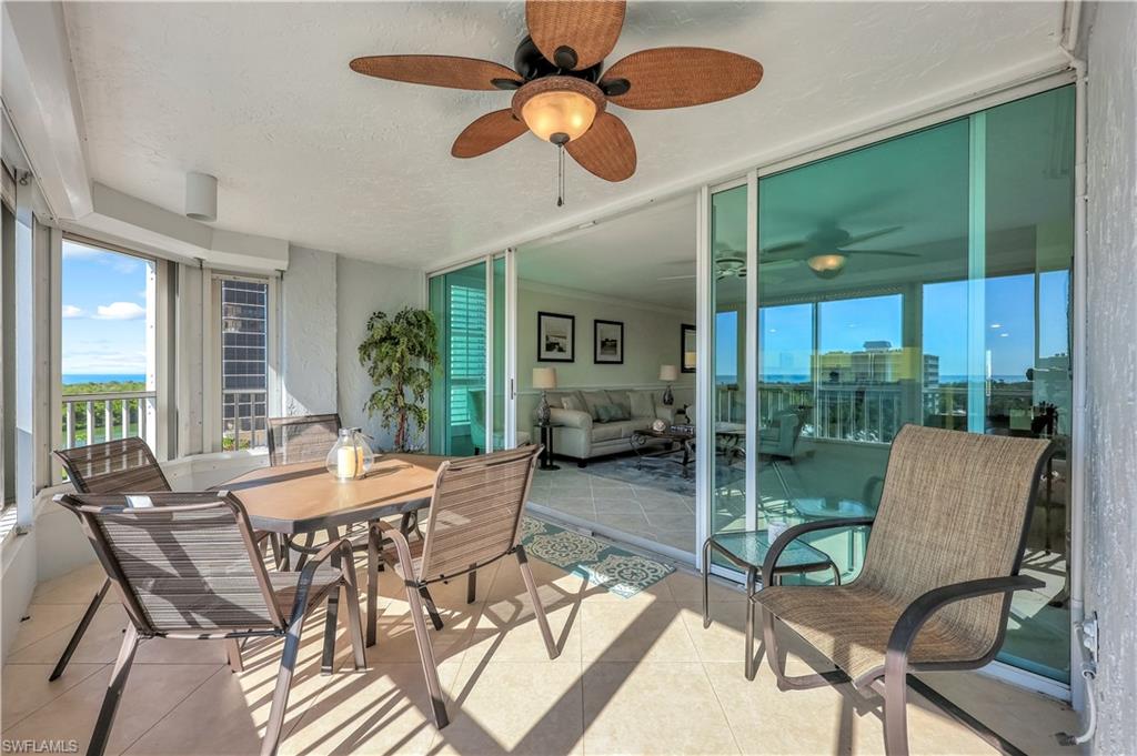 21 Bluebill Avenue, Unit B503 Naples, FL 34108 - Photo 31 of 40 a view of a dining room with furniture window and outside view