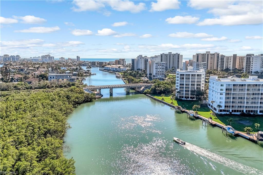 21 Bluebill Avenue, Unit B503 Naples, FL 34108 - Photo 35 of 40 a view of a city with tall buildings