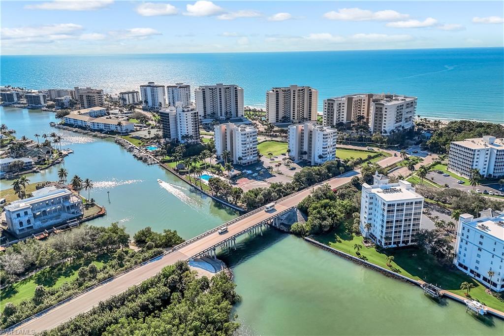 21 Bluebill Avenue, Unit B503 Naples, FL 34108 - Photo 9 of 40 a city view with tall buildings