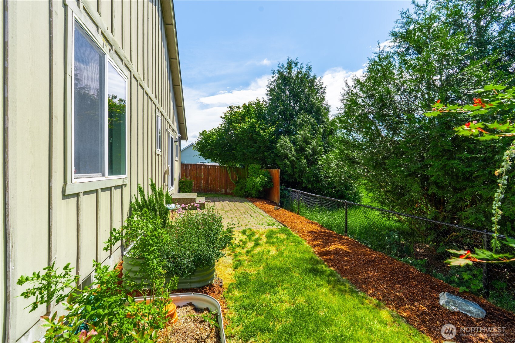 242 Riggs Drive East Enumclaw, WA 98022 - Photo 34 of 40 a view of back yard of the house