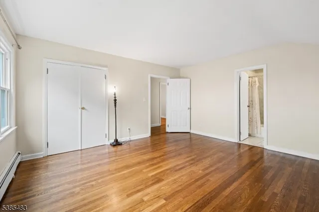 a bathroom with a sink mirror toilet and bathtub