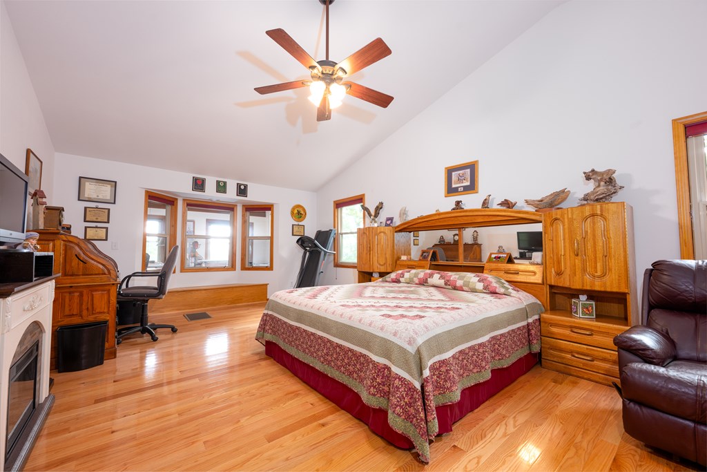 124 Cornerstone Murphy, NC 28906 - Photo 26 of 57 a bedroom with a bed and wooden floor