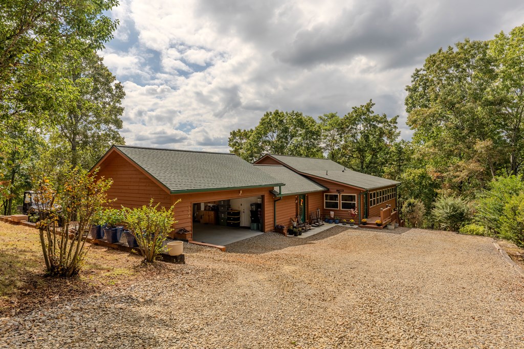 124 Cornerstone Murphy, NC 28906 - Photo 28 of 57 a view of a house with a yard and roof