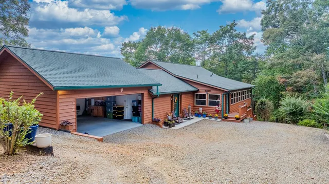 an aerial view of a house having yard