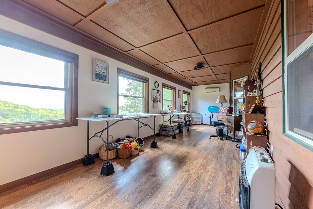 124 Cornerstone Murphy, NC 28906 - Photo 36 of 57 a living room with patio furniture and a large window