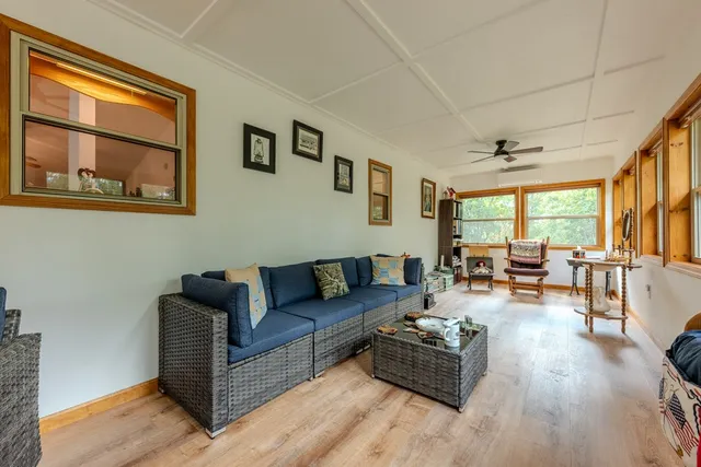 a view of a garden with a building in the background