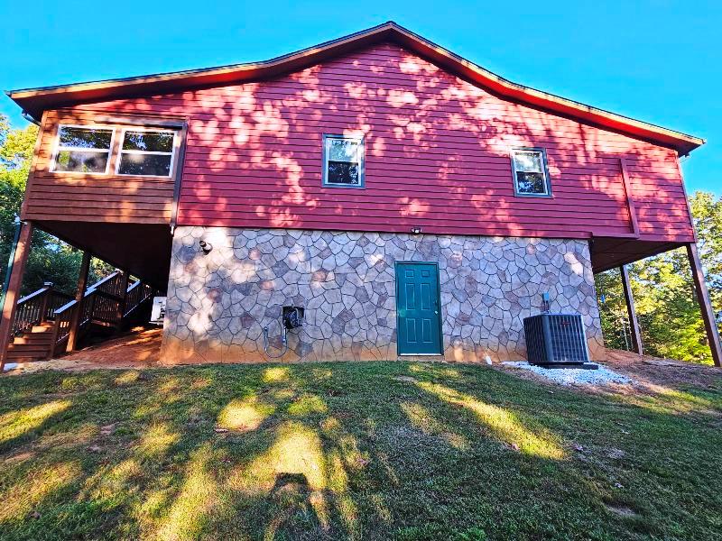 124 Cornerstone Murphy, NC 28906 - Photo 52 of 57 a front view of a house with a yard
