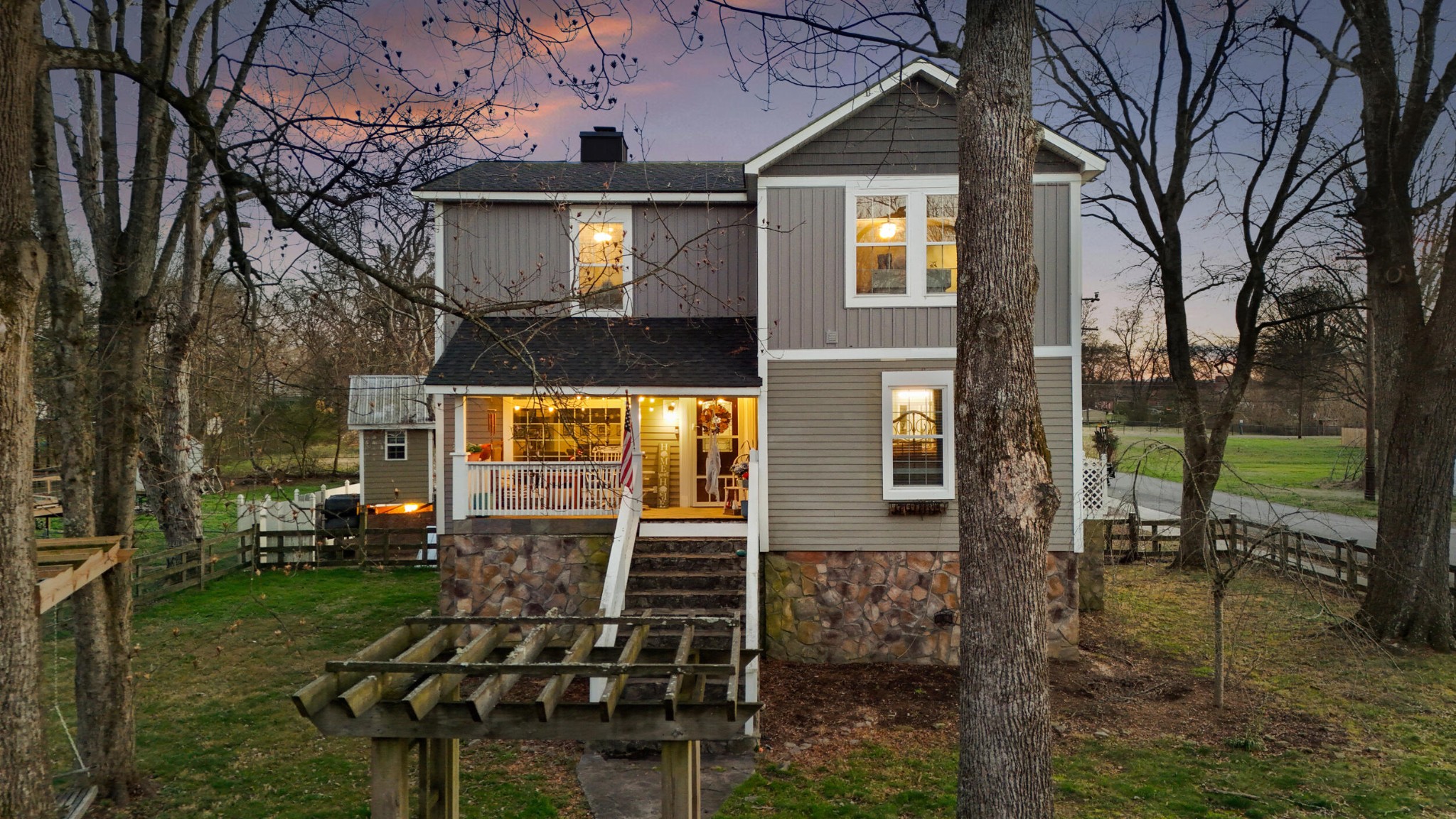 a front view of a house with a yard