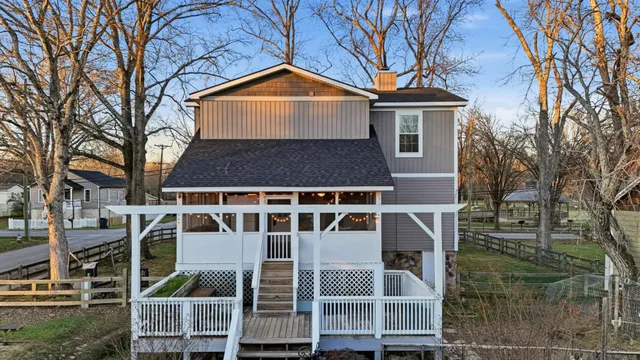 a front view of a house with glass windows