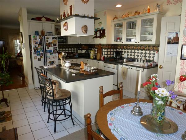 111 Larkspur Street Springfield, MA 01108 - Photo 3 of 9 a kitchen with a table and chairs in it