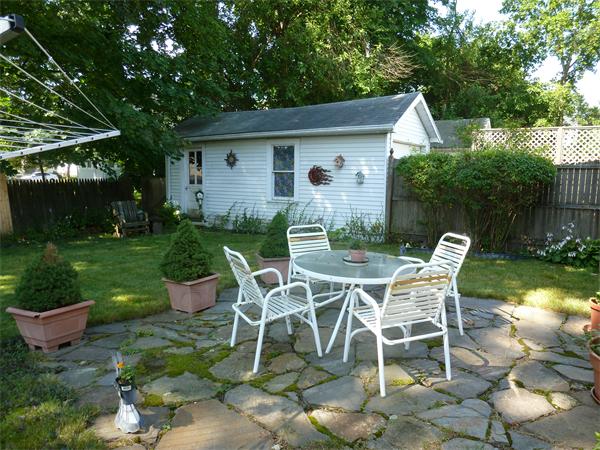 111 Larkspur Street Springfield, MA 01108 - Photo 8 of 9 a view of a house with backyard and sitting area