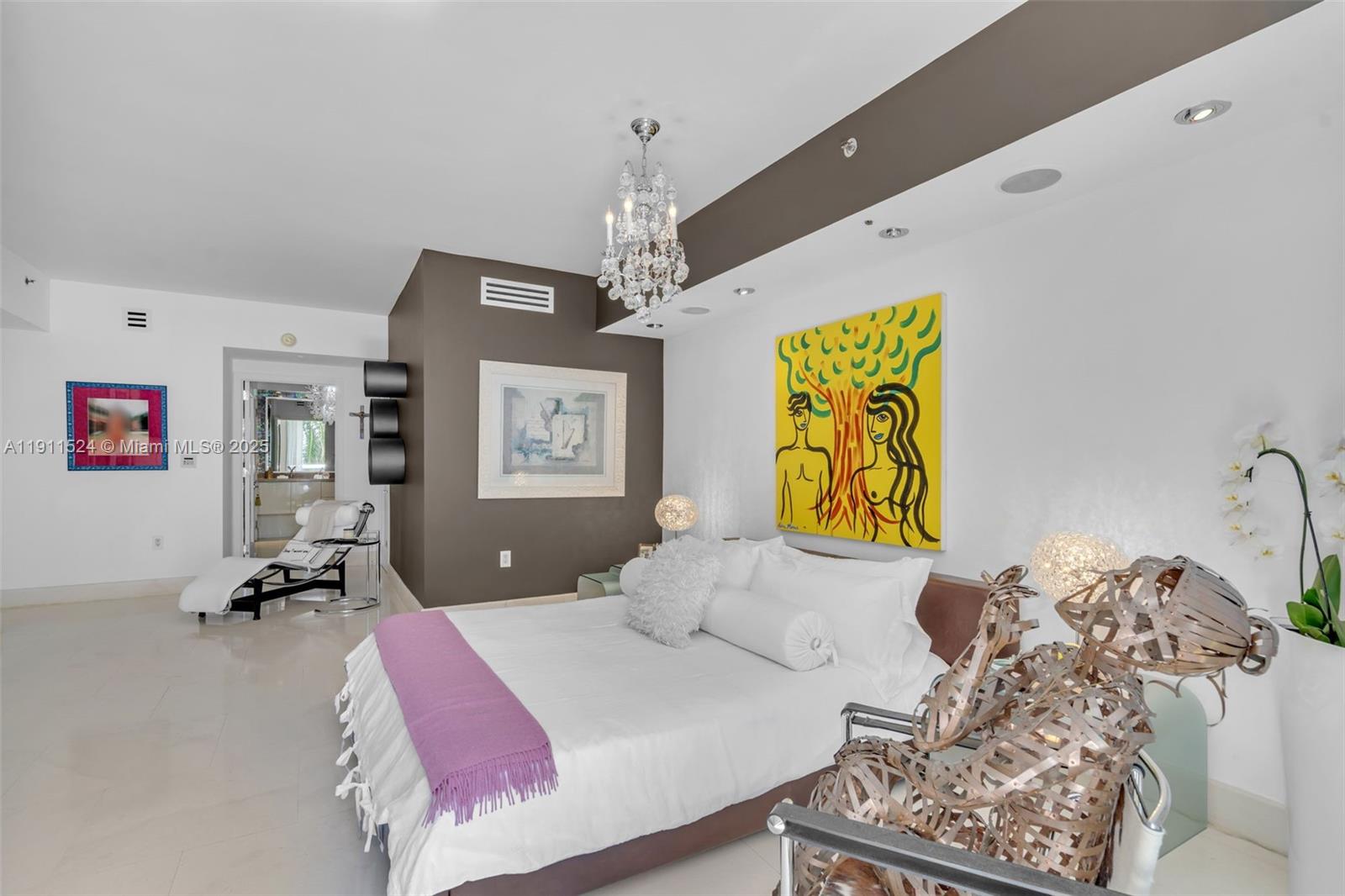 400 Alton Road, Unit 706 Miami Beach, FL 33139 - Photo 17 of 38 a bedroom with a bed window and couch