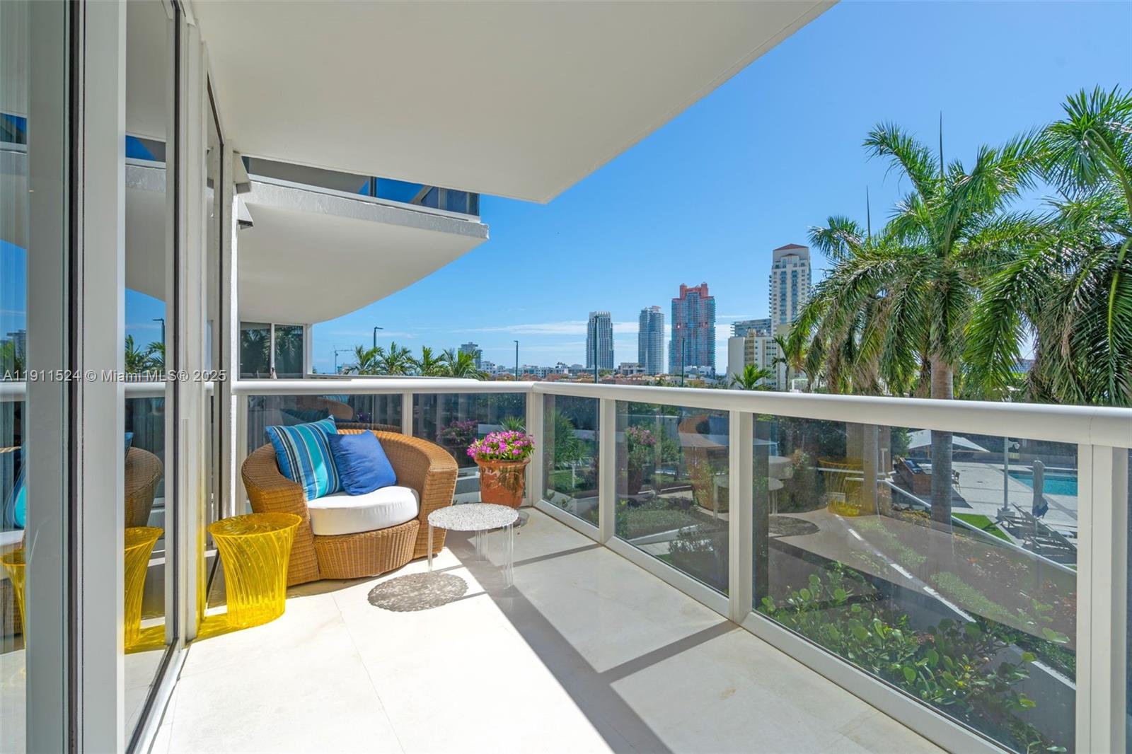 400 Alton Road, Unit 706 Miami Beach, FL 33139 - Photo 20 of 38 a view of a balcony with chairs