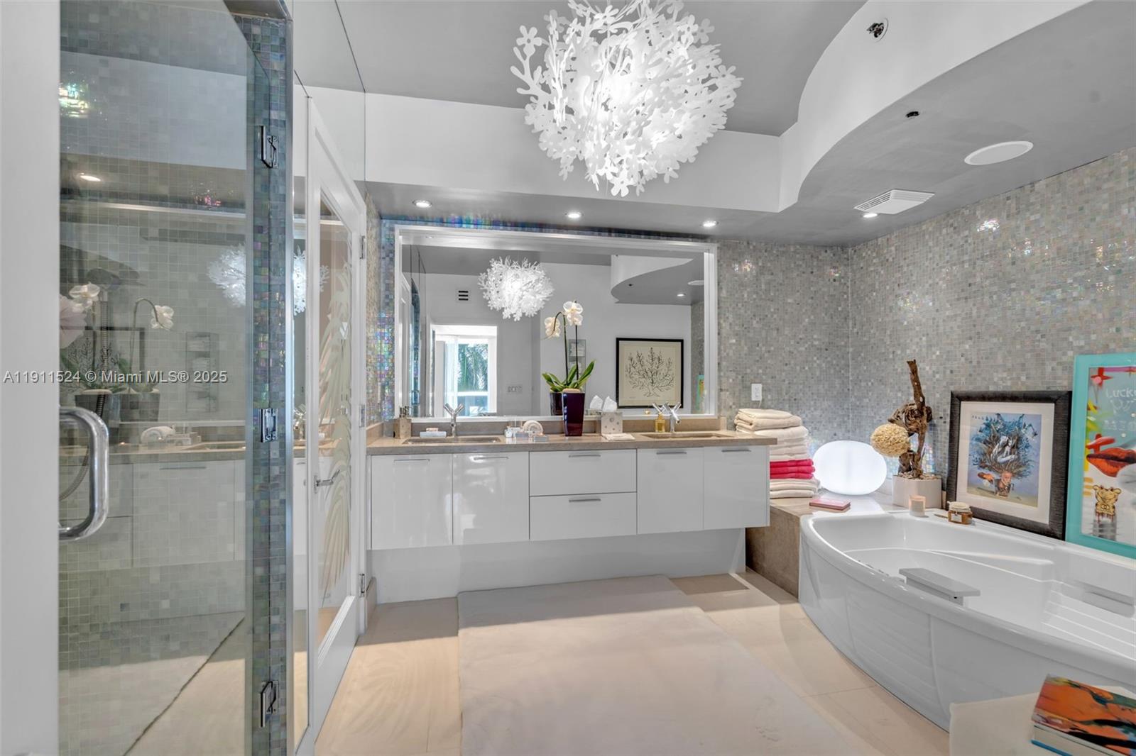 400 Alton Road, Unit 706 Miami Beach, FL 33139 - Photo 23 of 38 a large white kitchen with a large window